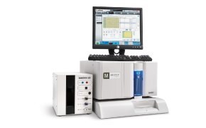 The Luminex® 200™ multiplexing system that analyzes up to 100 analytes per well. Monitor is on top showing well plate data.