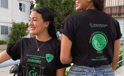 Two female students wearing T-shirts for the non-profit organization Beyond Benign