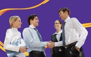 Four business professionals shaking hands and conversing, with a purple background and yellow and red swirls.