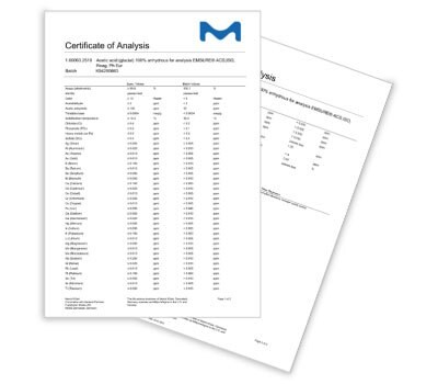 overlapping pages of a Certificate of Analysis (CoA) for an EMSURE® product, featuring the Merck logo prominently at the top. The document lists various analytical parameters and corresponding batch-specific values in a detailed table format. Each parameter includes measured values along with regulatory compliance limits for comparison. The impurity profile is thorough, emphasizing the high quality of EMSURE® products, which offer maximum specifications with minimal impurities. 